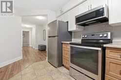 217 - 4658 DRUMMOND ROAD | Niagara Falls Ontario | Slide Image Five