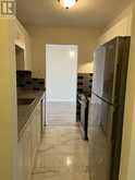 302 - 4692 CRYSLER AVENUE | Niagara Falls Ontario | Slide Image Three