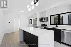 209 - 7277 WILSON CRESCENT | Niagara Falls Ontario | Slide Image Three