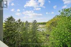 405 - 2511 LAKESHORE ROAD W | Oakville Ontario | Slide Image One