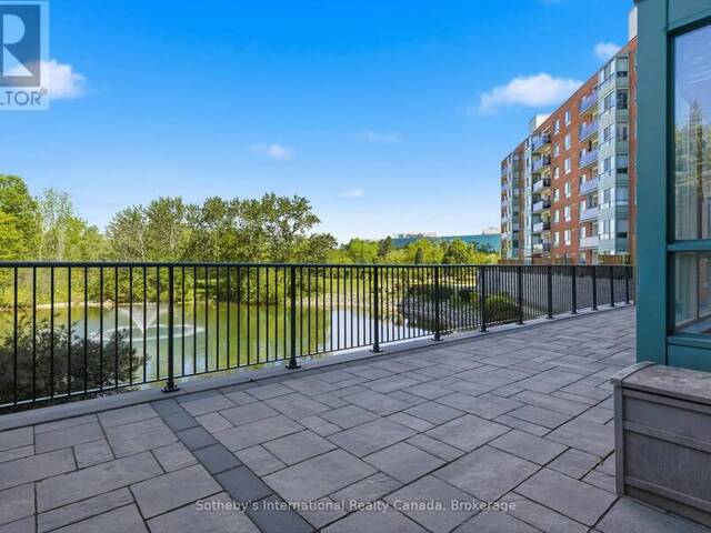 102 - 30 BLUE SPRINGS DRIVE Waterloo Ontario, N2J 4T2 - 2 Bedrooms Waterfront Condo For Sale