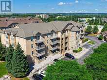 406 - 1800 WALKERS LINE | Burlington Ontario | Slide Image One