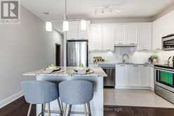 414 - 2470 PRINCE MICHAEL DRIVE | Oakville Ontario | Slide Image Three