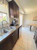 65 - 2179 FIDDLERS WAY | Oakville Ontario | Slide Image Three