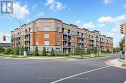 220 - 5317 UPPER MIDDLE ROAD | Burlington Ontario | Slide Image One