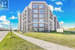 307 - 610 FARMSTEAD DRIVE | Milton Ontario | Slide Image One