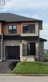 311 KADING CRESCENT | Woodstock Ontario | Slide Image Two