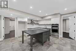 241 TAMARACK BOULEVARD | Woodstock Ontario | Slide Image Thirty