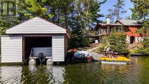 1 Windy Lake Shorty's Island | Dowling Ontario | Slide Image Eight