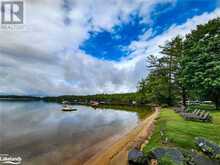 3876 MUSKOKA ROAD 118 Unit# Sandfield 2 Week 10 | Port Carling Ontario | Slide Image Two