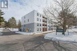 210 - 65 SILVERCREEK PARKWAY N | Guelph Ontario | Slide Image One