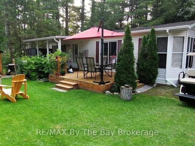 G4 - 85 THEME PARK DRIVE Wasaga Beach Ontario, L9Z 1X7 - 2 Bedrooms Home For Sale