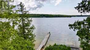 340 BARNEY'S BOULEVARD | Miller Lake Ontario | Slide Image Two