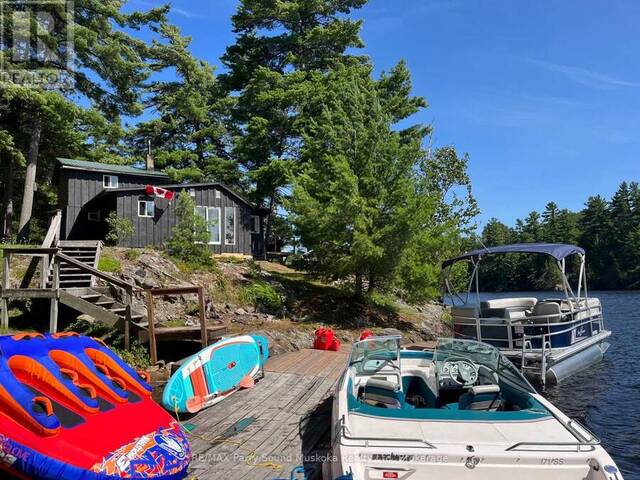 104 KAWIGAMOG LAKE Parry Sound Ontario, P0H 1S0 - 2 Bedrooms Waterfront Home For sale