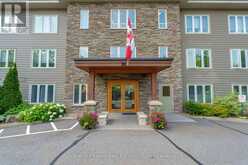 205 - 26 DAIRY LANE | Huntsville Ontario | Slide Image One