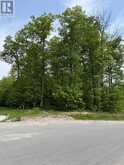 LT 49 WHISPERING PINE CIRCLE E | Tiny Ontario | Slide Image One