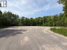 LT 49 WHISPERING PINE CIRCLE E | Tiny Ontario | Slide Image Three