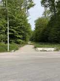 LT 49 WHISPERING PINE CIRCLE E | Tiny Ontario | Slide Image Five