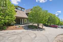 101 - 1 TREE TOPS LANE | Huntsville Ontario | Slide Image One
