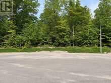 LT 50 WHISPERING PINE CIRCLE E | Tiny Ontario | Slide Image One