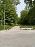 LT 50 WHISPERING PINE CIRCLE E | Tiny Ontario | Slide Image Three
