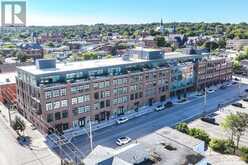 212 - 21 MATCHEDASH STREET S | Orillia Ontario | Slide Image One