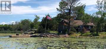380 2 ISLAND | Port Severn Ontario | Slide Image One