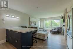 54 - 54-305 DEERHURST, SUMMIT LODGE DRIVE | Huntsville Ontario | Slide Image Three