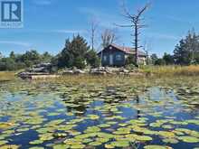 380 2 ISLAND | Port Severn Ontario | Slide Image One