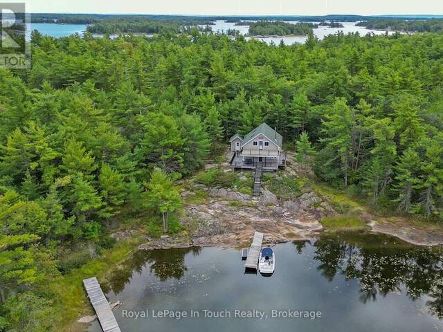 7772 ISLAND 1810/BONE ISLAND Honey Harbour Ontario, P0E 1E0 - 2 Bedrooms Waterfront Home For sale