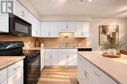 38 - 210 DAWN AVENUE | Guelph Ontario | Slide Image Three