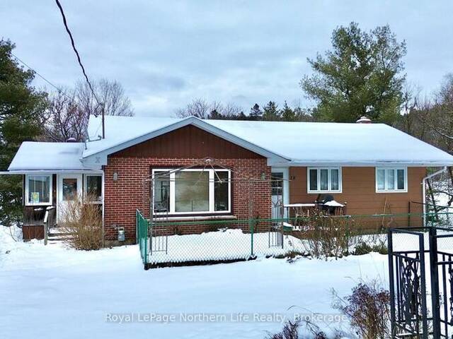 18 BIG BEND AVENUE Powassan Ontario, P0H 1Z0