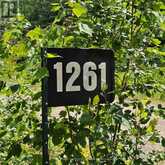 1261 SNAKE CREEK ROAD | Mattawan Ontario | Slide Image One