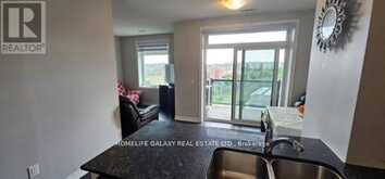 406 - 39 NEW DELHI DRIVE | Markham Ontario | Slide Image Two