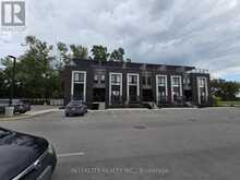 318 - 6065 MCLEOD ROAD | Niagara Falls Ontario | Slide Image One