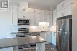 503 - 3265 CARDING MILL TRAIL | Oakville Ontario | Slide Image Four