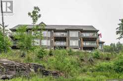 102 - 4 TREE TOPS LANE | Huntsville Ontario | Slide Image One