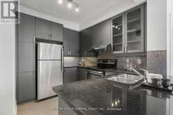 407 - 151 UPPER DUKE CRESCENT | Markham Ontario | Slide Image Sixteen