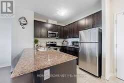 203 - 39 NEW DELHI DRIVE | Markham Ontario | Slide Image Ten