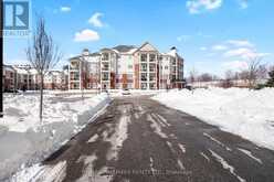 227 - 80 ASPEN SPRINGS DRIVE | Clarington Ontario | Slide Image One