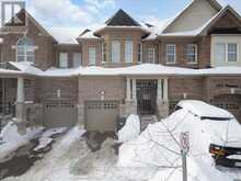 4 HOGAN MANOR DRIVE | Brampton Ontario | Slide Image Two