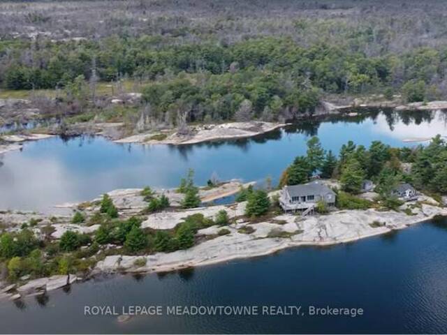 KG9005 SHIP'S RAIL ISLAND Parry Sound Ontario, P0G 1A0 - 2 Bedrooms Waterfront Home For sale