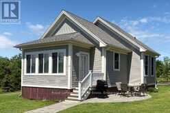 58 - 115 BUTTERNUT LANE | Prince Edward Ontario | Slide Image One