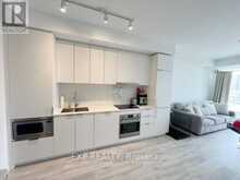N735 - 7 GOLDEN LION HEIGHTS | Toronto Ontario | Slide Image Two