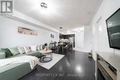 412 - 70 BAYCLIFFE CRESCENT | Brampton Ontario | Slide Image One