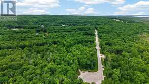 LOT 40 WHISPERING PINE CIRCLE | Tiny Ontario | Slide Image Five