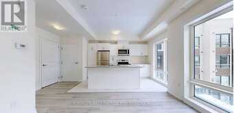 32 - 165 TAPSCOTT ROAD | Toronto Ontario | Slide Image Four