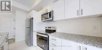 32 - 165 TAPSCOTT ROAD | Toronto Ontario | Slide Image Seven