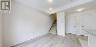 32 - 165 TAPSCOTT ROAD | Toronto Ontario | Slide Image Eight