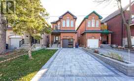203 RALEIGH AVENUE | Toronto Ontario | Slide Image One